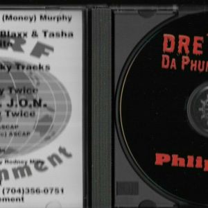 Dre Rock da phunkwarlock phlip dat inlay & CD.jpg